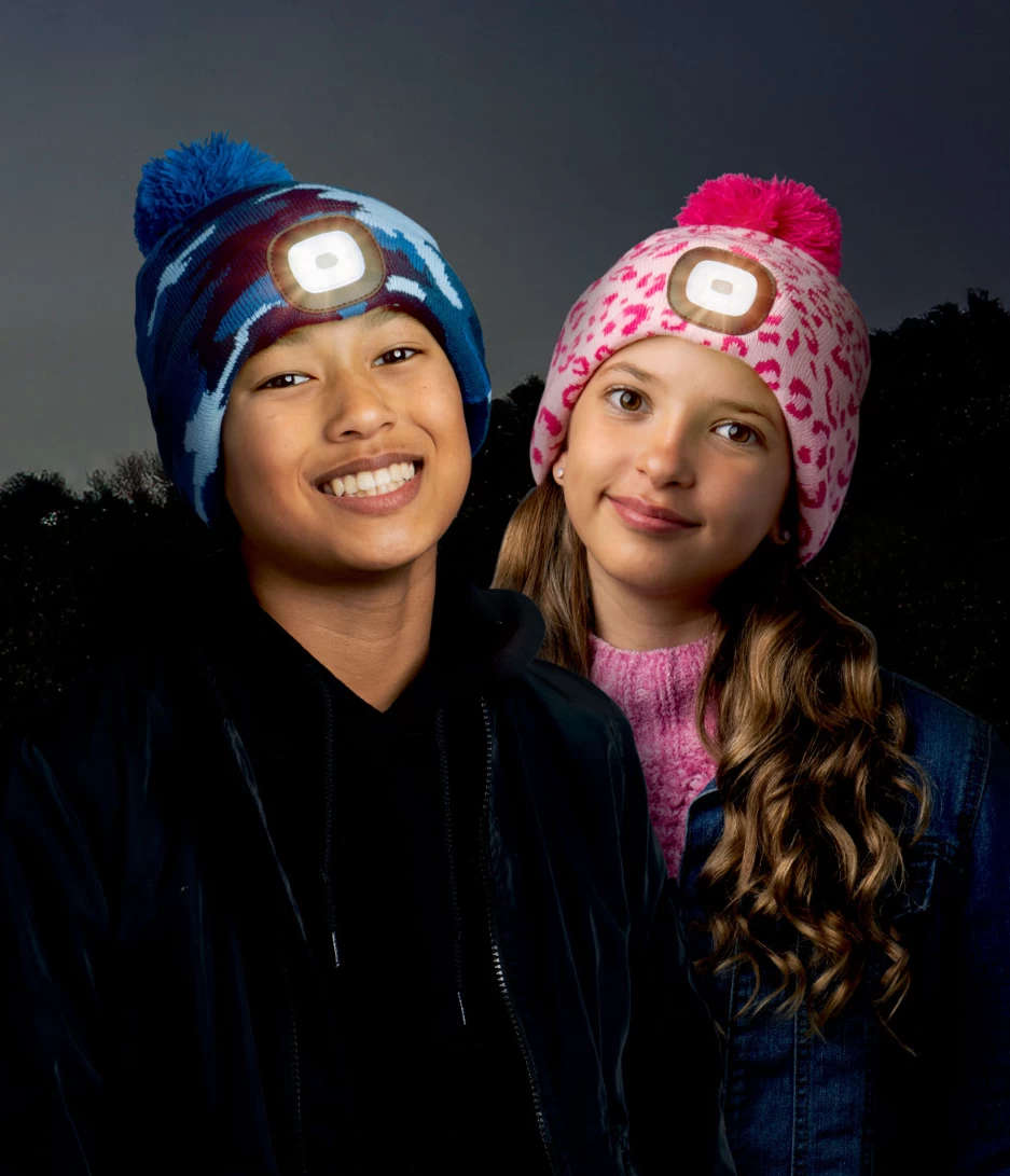 Pink Leopard Kids Night Scope™ Rechargeable LED Light Beanie Pom Hat 2 Pink Leopard Kids Night Scope™ Rechargeable LED Light Beanie Pom Hat - Image 2
